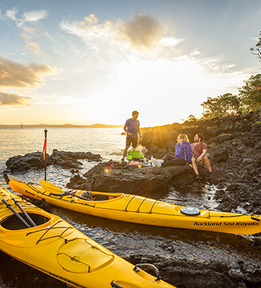 Dreamaroo Luxury, Active Vacation New-Zealand, Three Friends and Two Yellow Kayaks By The Sunny Shore Image